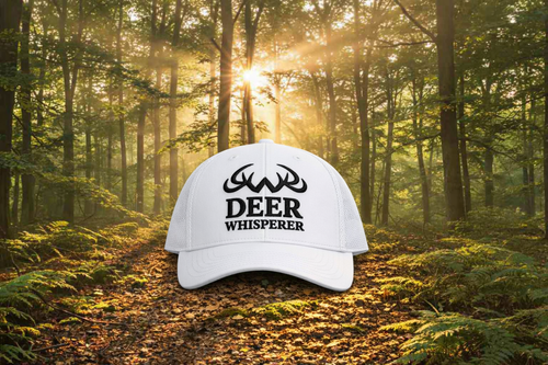 White embroidered Deer Whisperer trucker cap